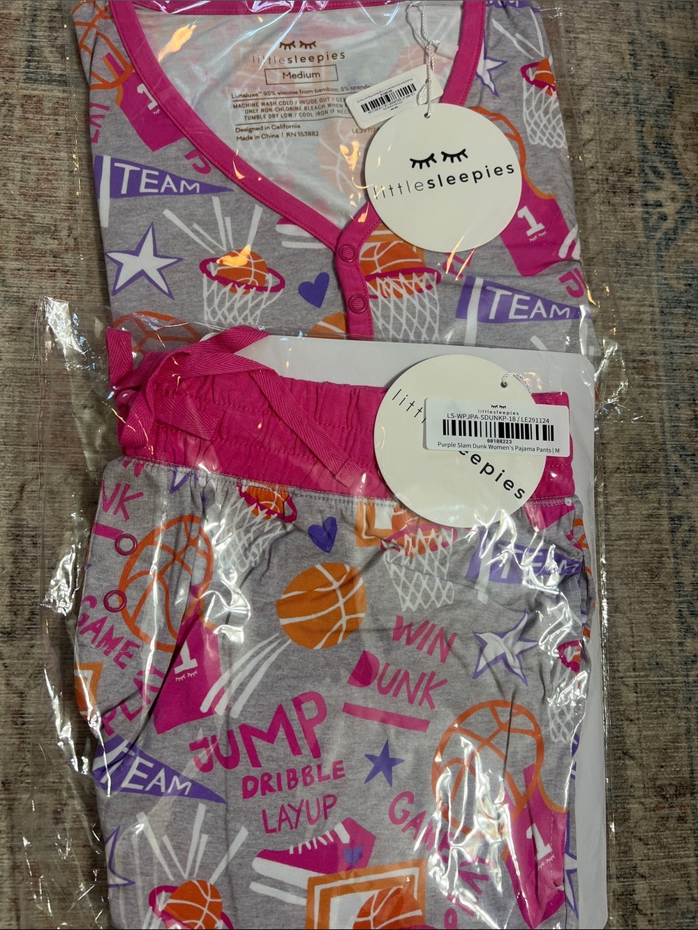 Womens little Sleepies size medium slam dunk set. Pants and long sleeve top.